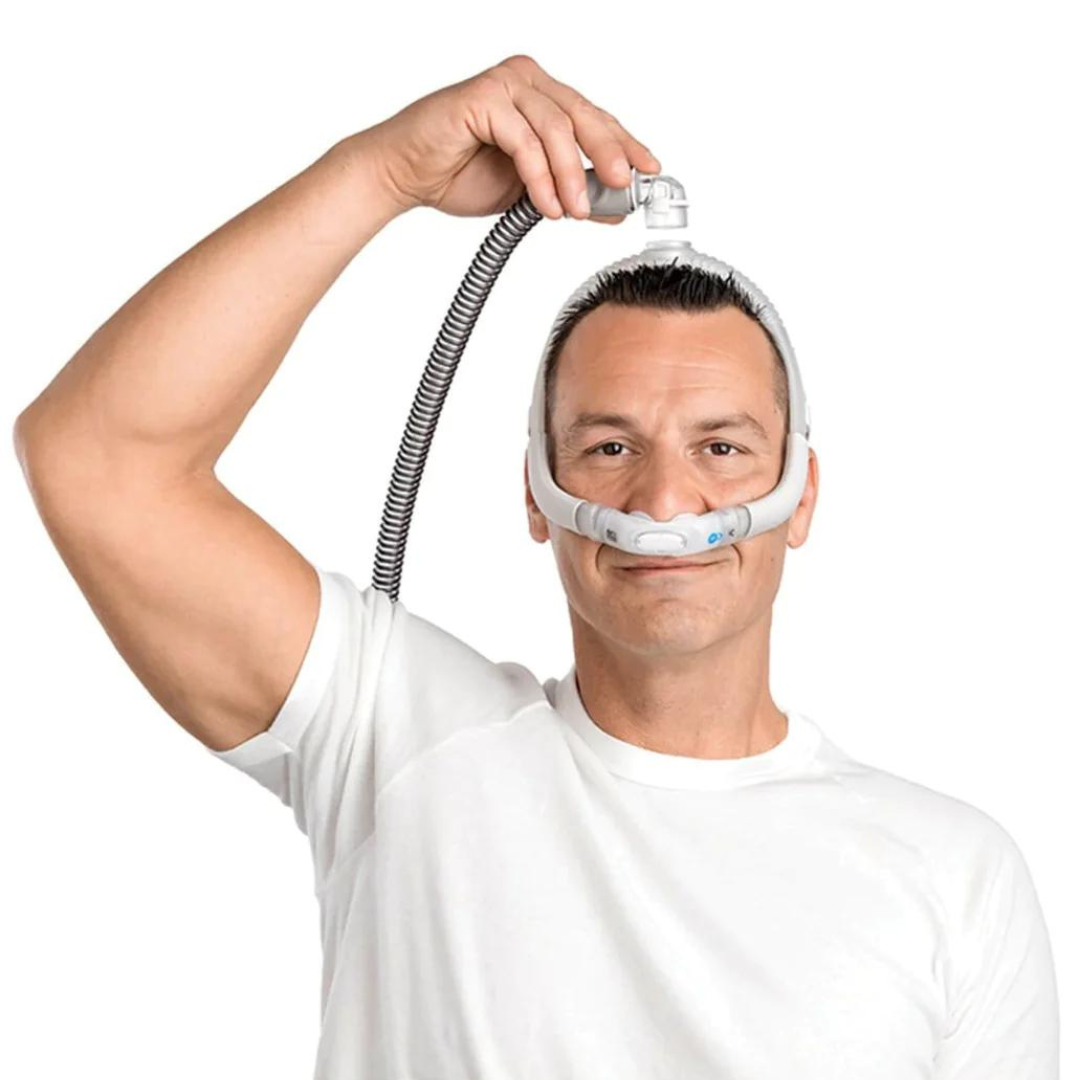 EssentialAir CPAP - Toronto Sleep Specialist - Person wearing ResMed AirFit P30i Mask